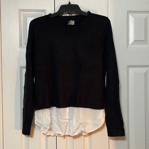 Black sweater/blouse.